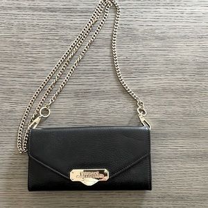 Versace collection black leather envelope clutch with gold  chain.
